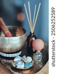 Beautiful holistic natural healing theme with singing bowl, semi-precious stones, cupping therapy and scent diffuser, all in a vintage, relaxing look