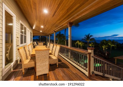 Beautiful Home Exterior Patio Deck and Dining Table with Sunset View