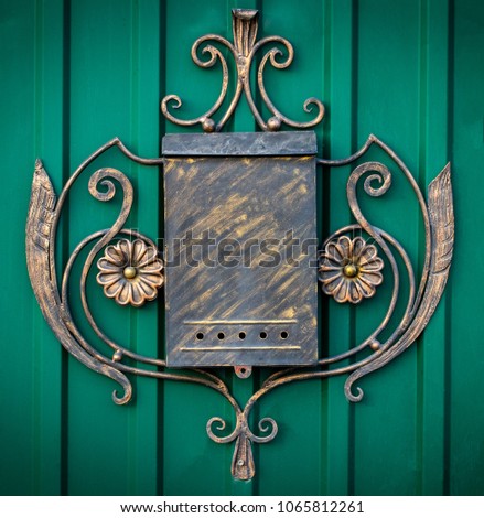 Beautiful home mailbox with elements of forging.