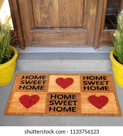 Beautiful Home Sweet Home Peach Color Coir Doormat With Hearts Placed Outside Door