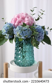 Beautiful Hortensia Flowers In Vase On Stand Indoors