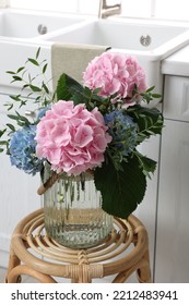 Beautiful Hortensia Flowers In Vase On Stand Indoors