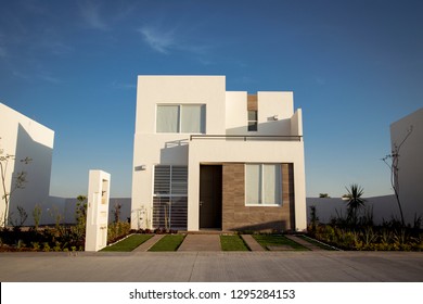 Beautiful house with minimalist architecture, sunny day. - Shutterstock ID 1295284153
