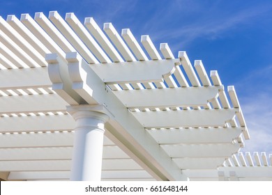 Beautiful House Patio Cover Against The Blue Sky.