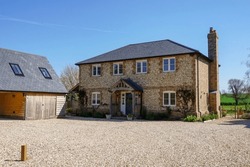 Beautiful House In Rural England. Exterior Of Detached Country Home 