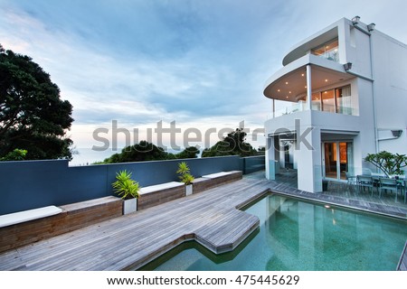 beautiful house with swimming pool in the yard
