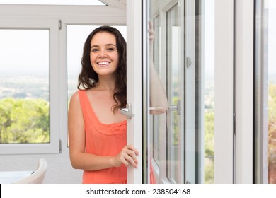 Beautiful Housewife Is Happy To Have New Plastic Windows 