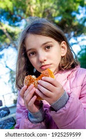 Beautiful Hungry Teen Girl Eating Hamburger, Junk Food