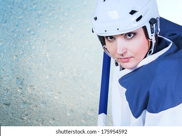 Beautiful Ice Hockey Female Player Fashion Portrait On The Ice Background