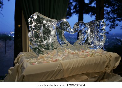 A Beautiful Ice Sculpture Of A Swan At Wedding