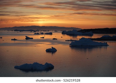 beautiful icebergs with sunset on arctic ocean, Greenland - Powered by Shutterstock