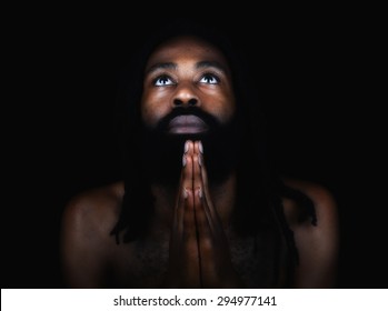 Beautiful Image of a Afro American man Praying
