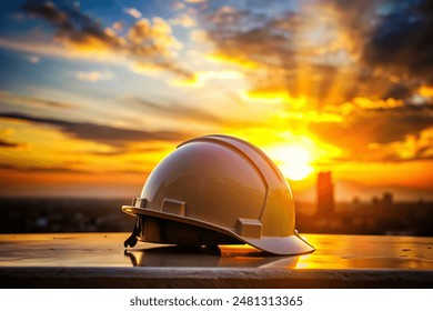 Beautiful image of an engineering helmet at sunset, civil construction