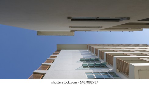 Beautiful Image Of Two Building In Worms Eye View With Blue Sky