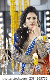Beautiful Indian Bride wearing gold jewellery - Shutterstock ID 2394265733