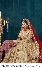 Beautiful Indian Bride wearing gold jewellery - Shutterstock ID 2394265735