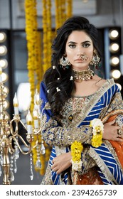 Beautiful Indian Bride wearing gold jewellery - Shutterstock ID 2394265739