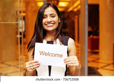 Beautiful Indian Female Hotel Manager Welcoming Guests