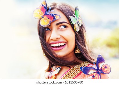 Beautiful indian woman with butterflies