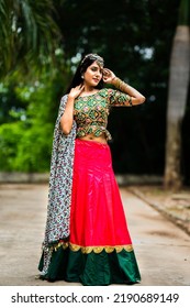 Beautiful Indian woman in traditional chaniya choli for navratri. Navratri is an Indian Festival and Chaniya choli its traditional costume - Shutterstock ID 2190689149