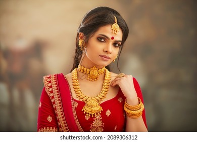 Beautiful Indian Woman In Traditional Dress And Jewelry.