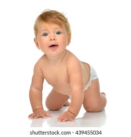 Beautiful Infant Child Baby Girl Naked In Diaper Learning How To Crawl Happy Looking At The Camera Isolated On A White Background