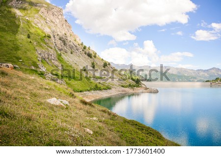 Beautiful Italian moutain lake of Cignana Valtournenche in a sunny summer day