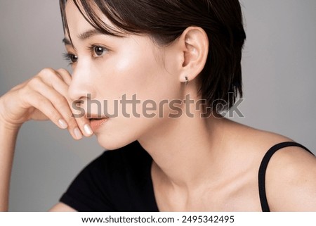 Similar – Image, Stock Photo a woman in profile in front of a meadow of flowers
