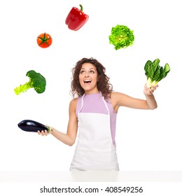 Beautiful Juggler Cook Woman Play With Vegetables Isolated On White