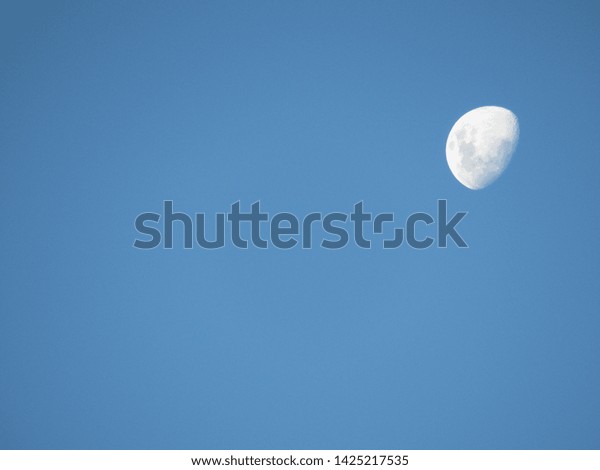 Beautiful July Moon In the Blue\
Sky