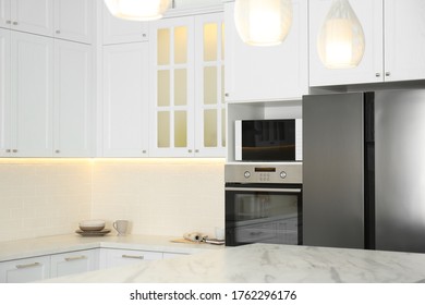 Beautiful kitchen interior with new stylish furniture - Shutterstock ID 1762296176