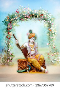 beautiful Krishna statue with flute flower pillar background - Shutterstock ID 1367069789