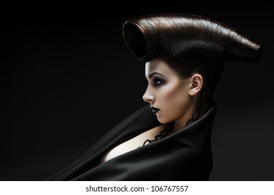 Beautiful lady with an improbable hairdress