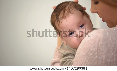 Similar – Baby taking feeding bottle