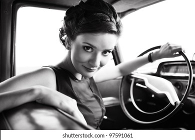 Beautiful Lady Sitting In A Retro Car