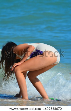 Beautiful Lady in Swimsuit on Tropical Beach