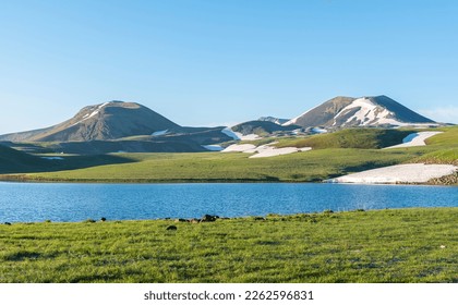 beautiful lake Akna at sunrise, Geghama volcanic mountains, Armenia - Powered by Shutterstock