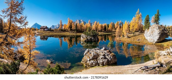 A beautiful lake in the autumn landscape. Autumn lake landscape. Autumn lake panorama. Autumn lake panoramic landscape - Shutterstock ID 2178391629