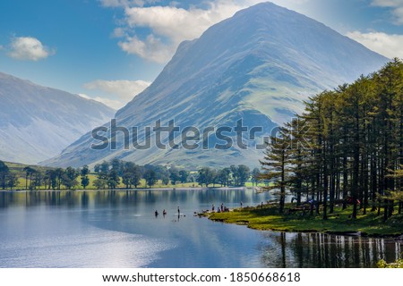 Beautiful lake of Buttermere surrounded by green hill in England's Lake District