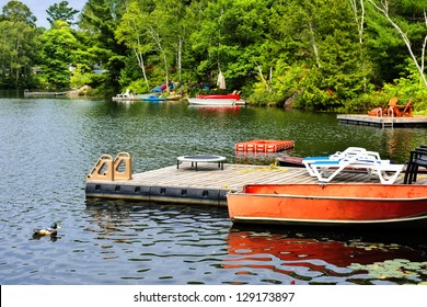 Beautiful lake with docks and diving platform in Ontario Canada cottage country