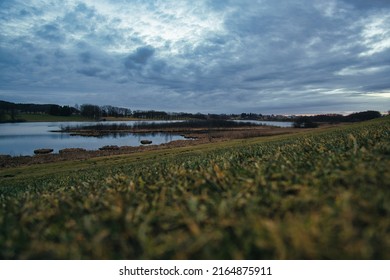beautiful lake in front of dramatic sky
