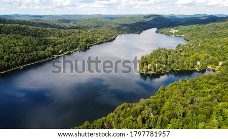 A beautiful lake and mountains in Saint-Adolphe-d’Howard region in Quebec