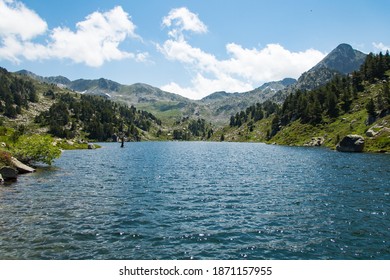 Beautiful lake at the Pyrenees mountains in Vall D'Aran - Shutterstock ID 1871157955