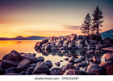 Beautiful Lake Tahoe At Sunset With Reflection In Water.