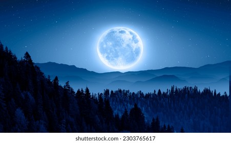 Beautiful landscape with blue misty silhouettes of mountains against super blue moon "Elements of this image furnished by NASA" - Powered by Shutterstock