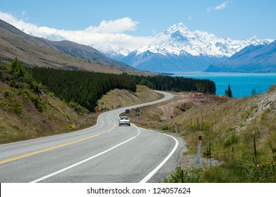 Beautiful Landscape Of Car, Road, Lake And Snow Mountain In South Island, New Zealand