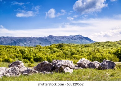 Beautiful landscape of Crimea in summer, Russia. Scenic panoramic view of the natural stones on the background of Chatyr-Dah mountain. Scenery of Southern coast of Crimea on sunny day.  - Shutterstock ID 635129552