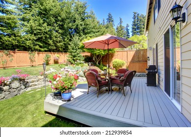 Beautiful Landscape Design For Backyard Garden And Patio Area On Walkout Deck