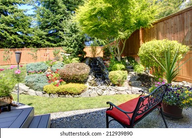 Beautiful landscape design for backyard garden with small bench