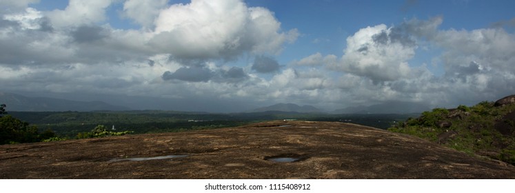 a beautiful landscape with dramatic clouds formation